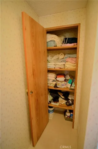 Linen Closet in Primary Bedroom En Suite