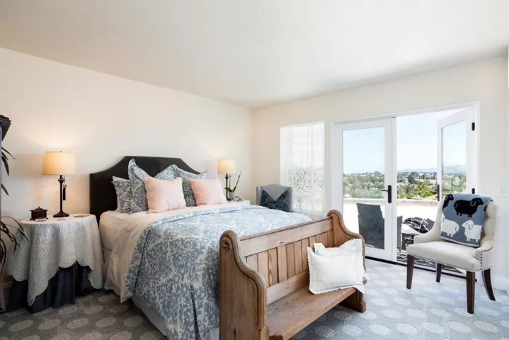 Spacious master with French doors to back patio.