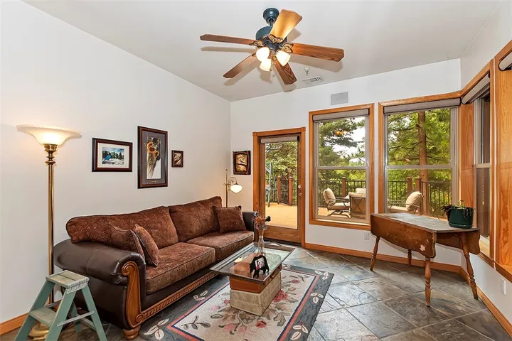 Sunroom
Large 3 X 6 Removable Windows W/ Slate floors.