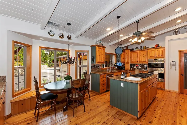 Kitchen/Informal Dining Area. Large Walk-in Pantry