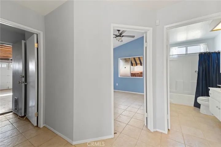 Hallway to Bedroom 1 and to Garage
