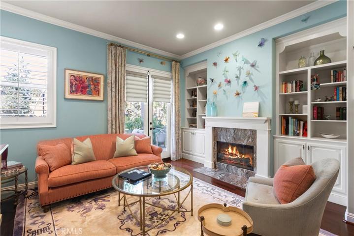 High ceilings on all levels add volume to every room...rich hardwood flooring runs throughout the entire first floor.