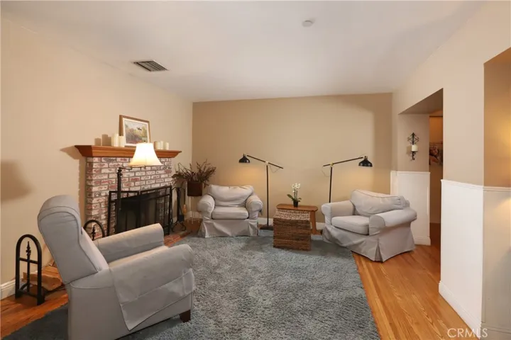 Living Room with wood burning Fireplace