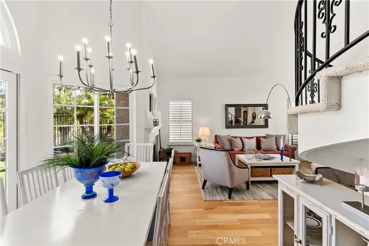 This wonderful floor plan is open and inviting. Enjoy the soaring ceilings and all of the narural light. The dining room has new french sliding doors.
