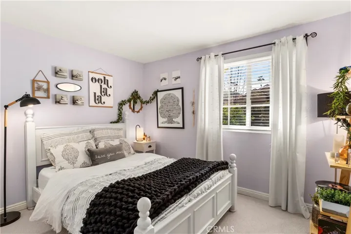 Secondary bedroom facing front of home.