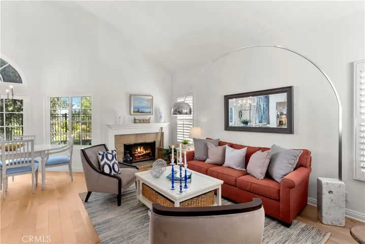 Beautiful wood flooring that is light and current. Soaring Ceilings, Fireplace and Shutters on most windows. This home is in turnkey condition and also has brand new heating and air conditioning system.