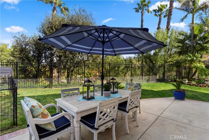 Enjoy peace and tranquility while you dine alfresco in your own backyard. Plenty of room for children and pets to play