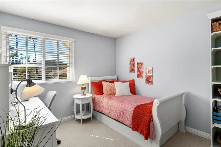Secondary bedroom facing front of home.