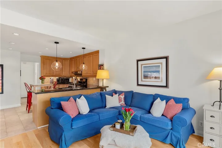 Family entertainment area with plenty of room to relax and enjoy yourself. Newer French Sliding Doors lead out to the outdoor area. Chef can still enjoy conversation with friends and family while cooking.