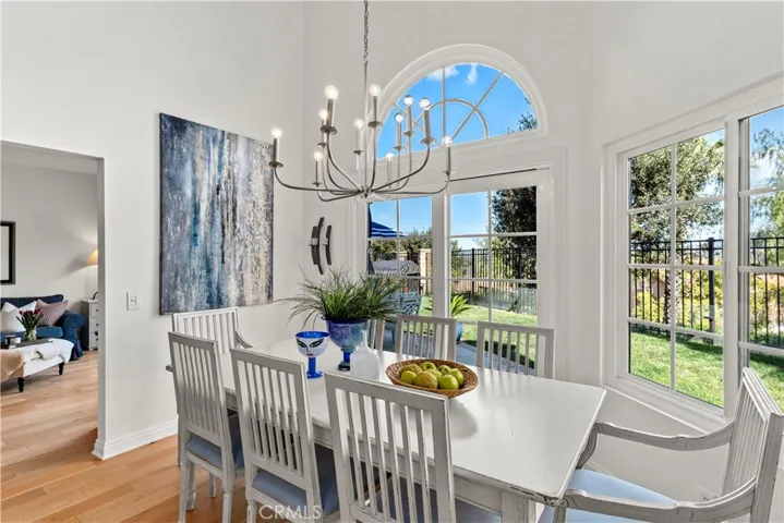 The dining area is so inviting. New French Sliding Doors lead you outdoors to the entertainment area.