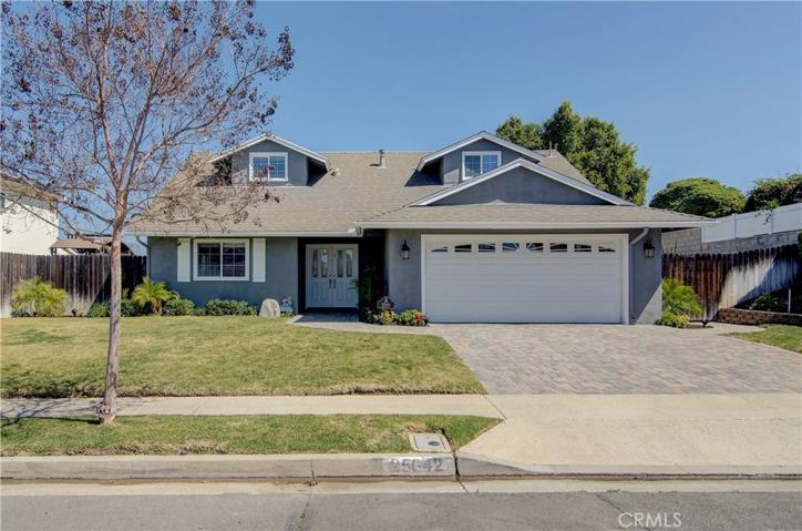 Nice street appeal with beautiful paver drive and walkway, new stucco finish and Cape Cod details.