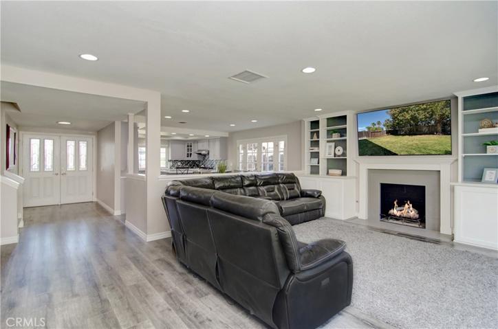 Large double door entry foyer sets the stage for this open concept layout and makes for easy transitions from space to space.