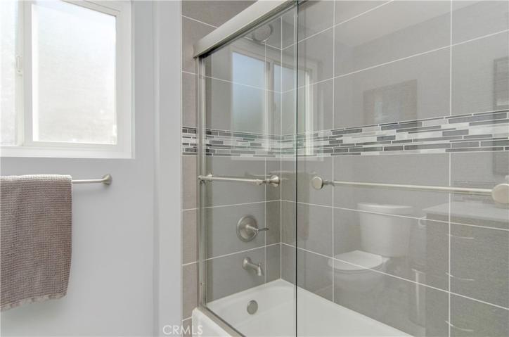 Sparkling, COMPLETELY remodeled downstairs bath.
