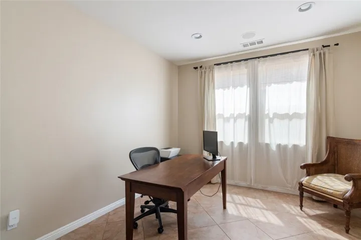 Downstairs office, possible bedroom or formal dining room