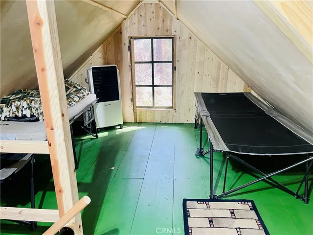 Upstairs bedroom/loft (left side)