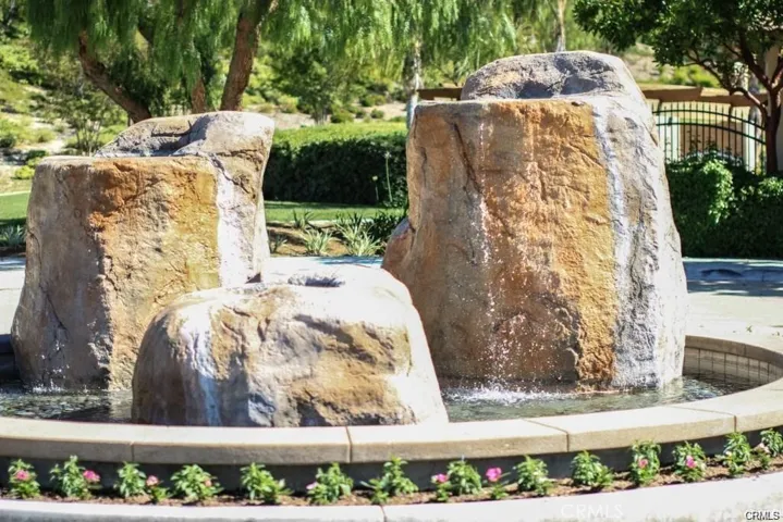 Fountain at the pool entrance.