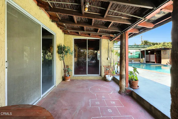 covered patio off pool