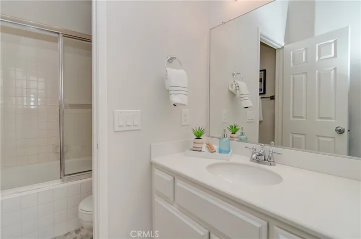 Secondary suite bath has plenty of storage/counter space and separate bathing area with relaxing soaking tub...a winner with everyone!
