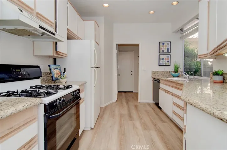 The direct access to attached garage could not be more convenient for unloading your shopping treasures...