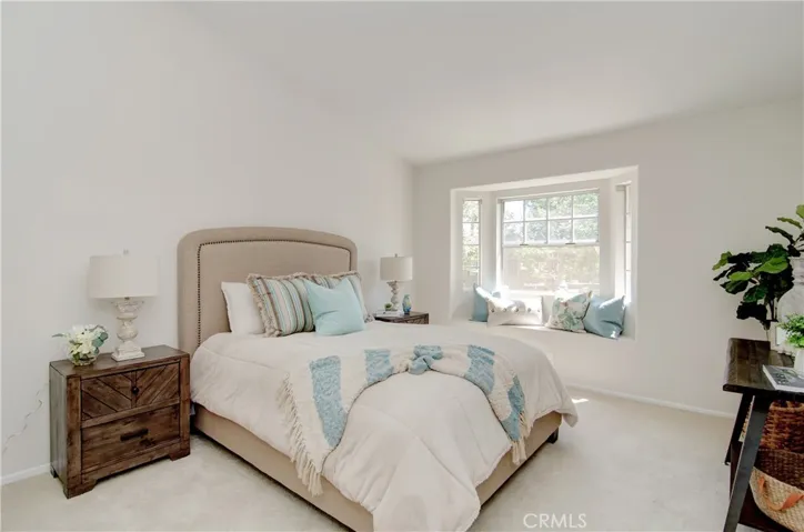 This owner's suite has plenty of space for a king size bed and more...