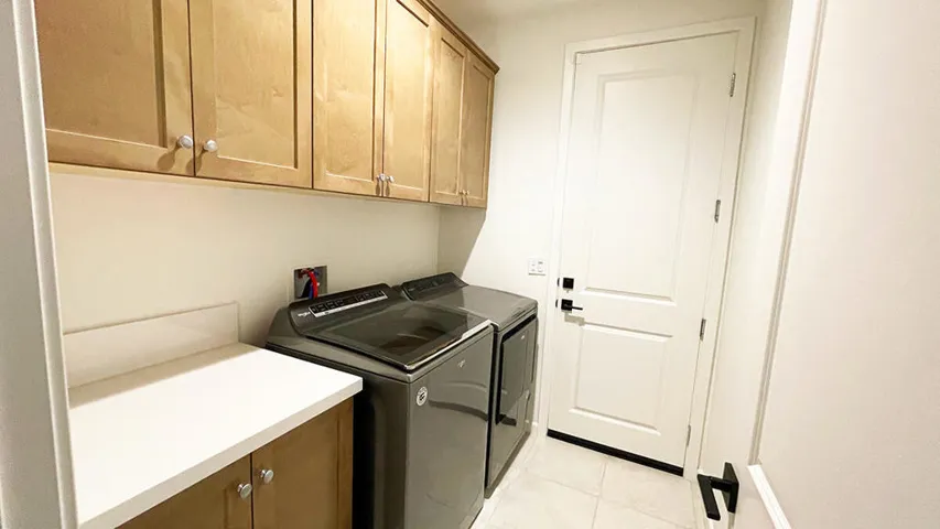Laundry room with upgraded appliances