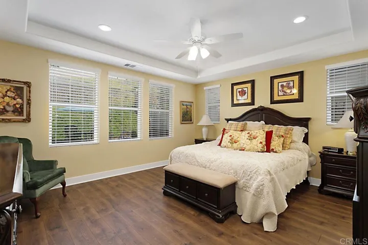 Huge primary bedroom suite on first level opening to beautiful bath and walk in closet.