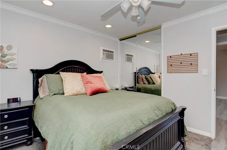 Closet in main bedroom contains custom closet organizers.