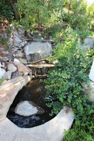 Tranquil Koi Pond with Waterfall