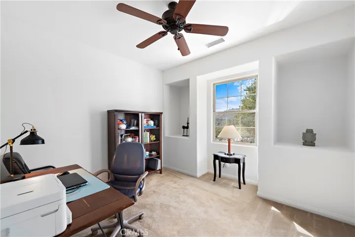 secondary bedroom being used as another office with pretty mountain views