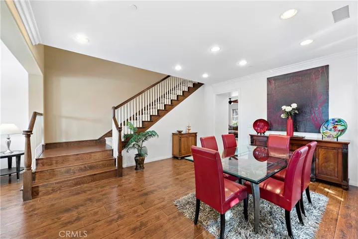 Dining area shows off the gorgeous wood flooring