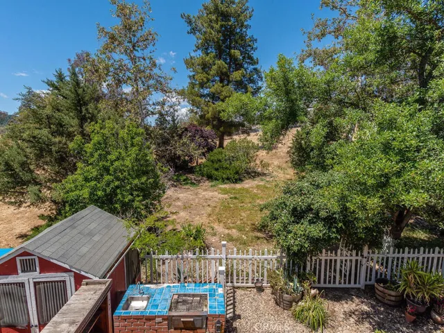View from Primary Suite Balcony, overlooking the Backyard
