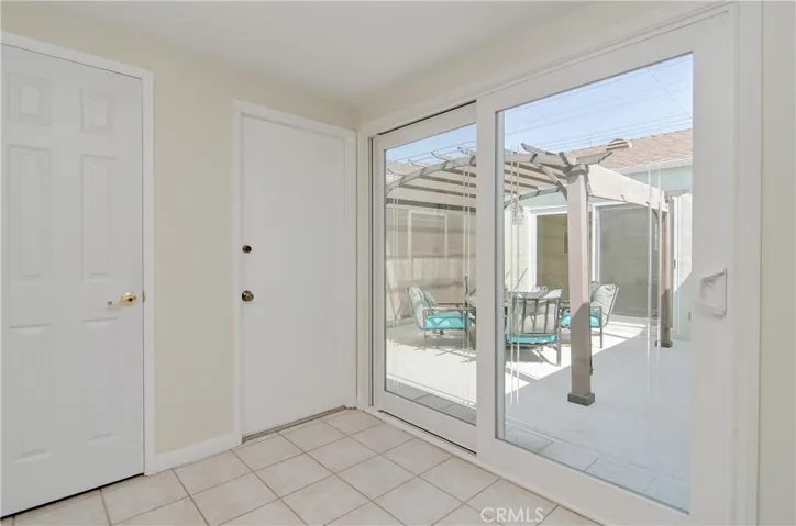 Even this spacious entry opens to the central atrium and provides an easy transition between spaces.