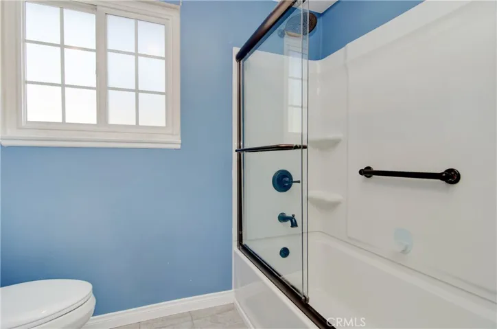 Roomy hall bath has extra storage and upgraded fixtures.