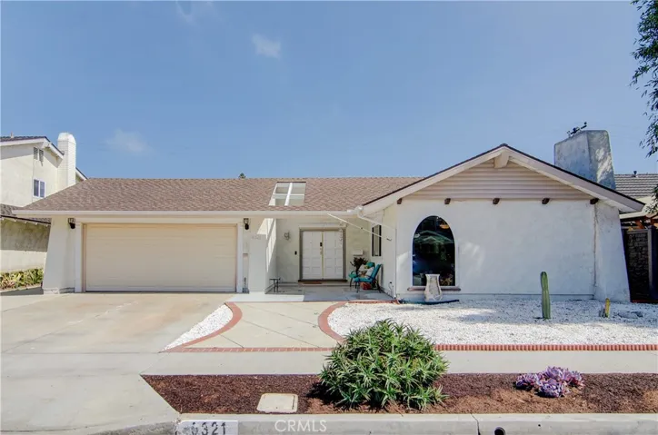 Mid tract location in fantastic HB neighborhood...EZ care landscape too!