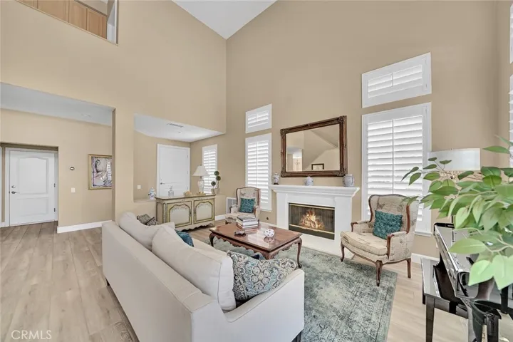 Warm living room with fireplace.