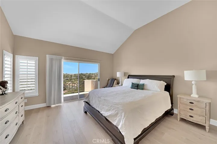 Open, bright and large master with balcony.