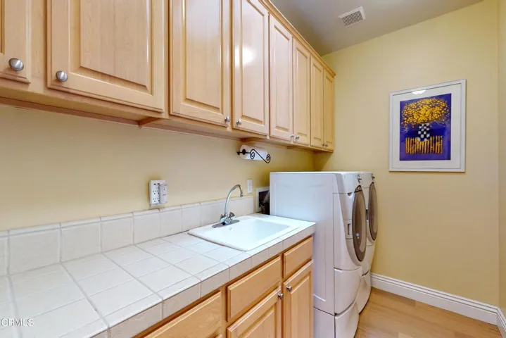 laundry room by bedrooms
