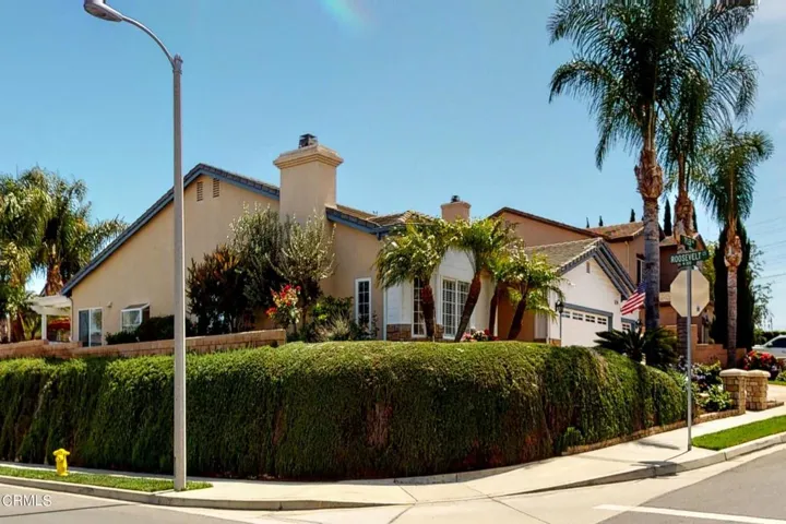 front of home with bank