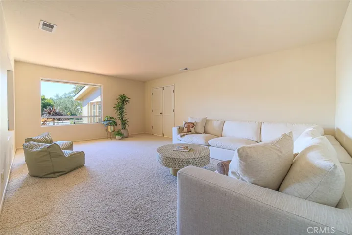 Formal living room. The doors open to the guest suite.