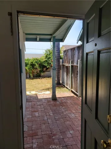 At the front door, back house