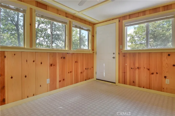 Bedroom with door to back deck