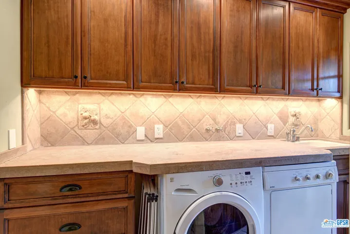 Laundry with folding counter and storage