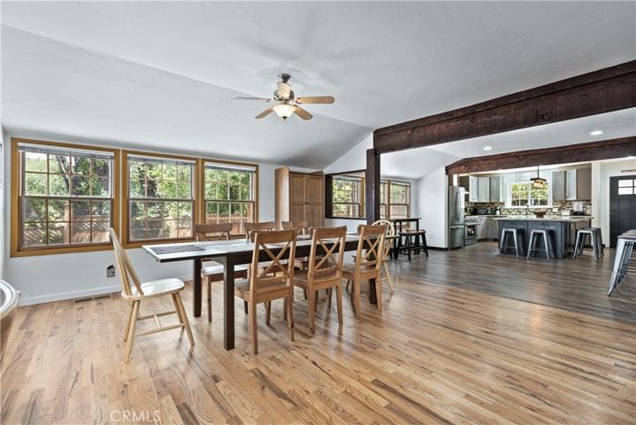 Lakefront wrap around views abound the open dining area.