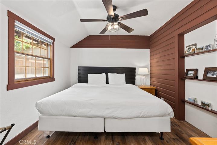 Main Floor King Bedroom with beautiful wood accents.