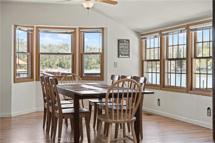 Lakefront wrap around views abound the open dining area.