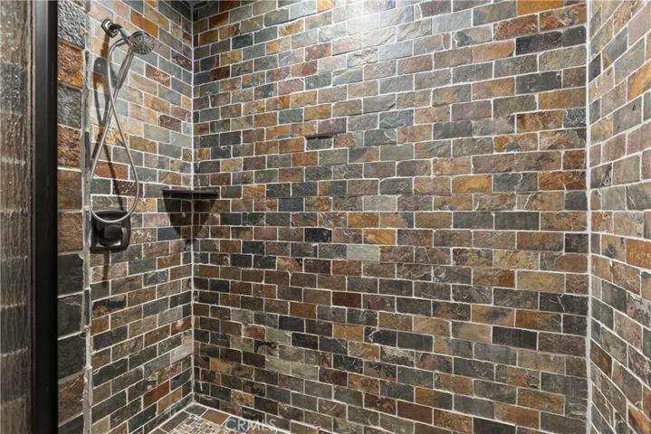 Main Level Master "Cave" slate walk in shower