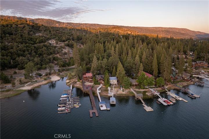 Situated at Falls Beach. The Long Dock at Bass Lake (Red house with long dock)
