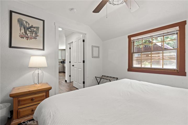 Main floor King Bedroom with beautiful wood accents.
