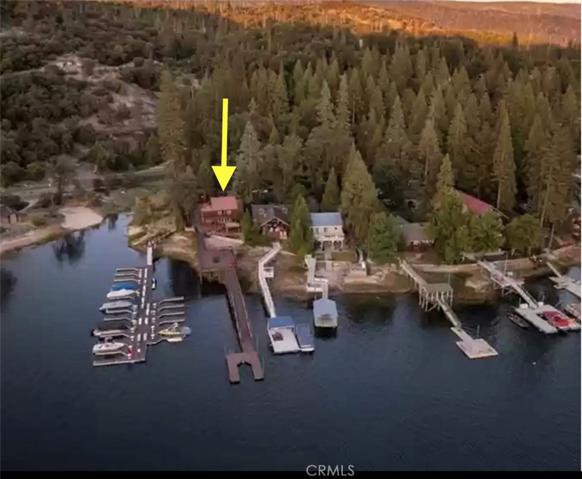Located on an end corner .24 acre lot. Long Dock Bass Lake
