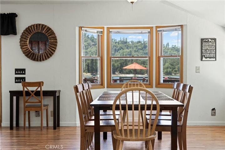 Lakefront wrap around views abound the open dining area.